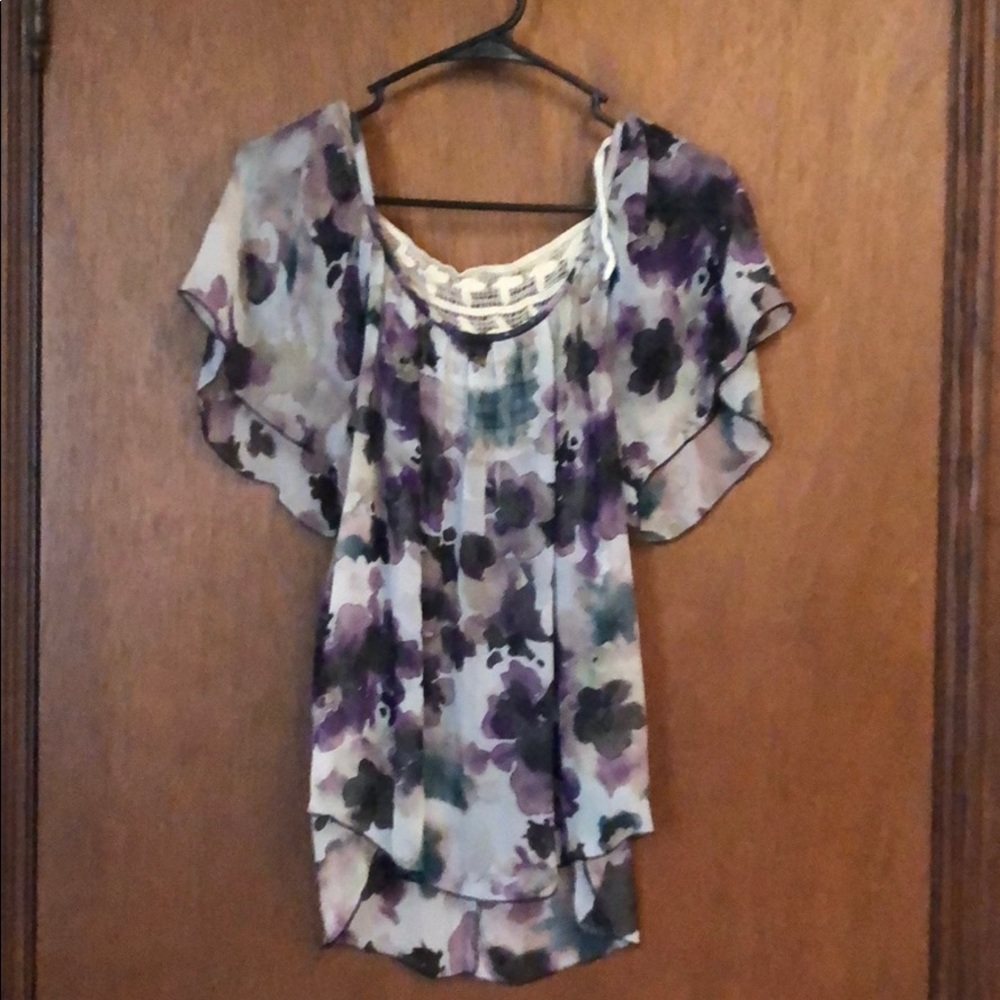 Sheer flower shirt.